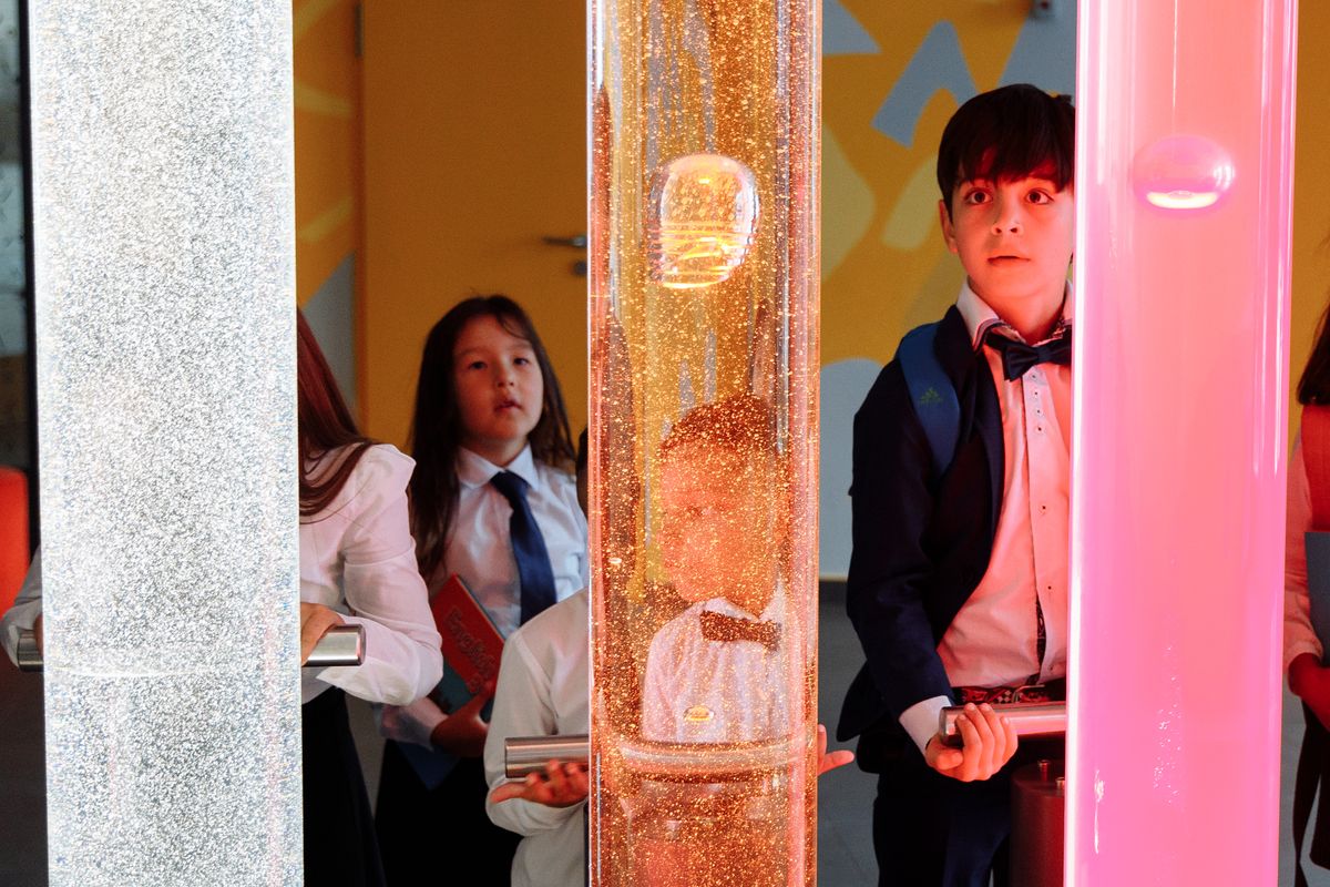 Children exploring a hands-on science exhibit